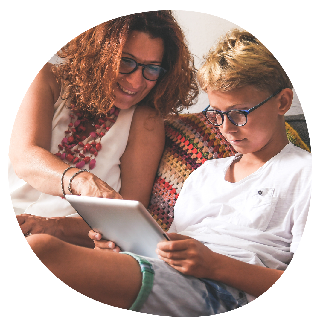 Child interacting with Trial Flow on an iPad with his mother Child interacting with Trial Flow on an iPad with his mother