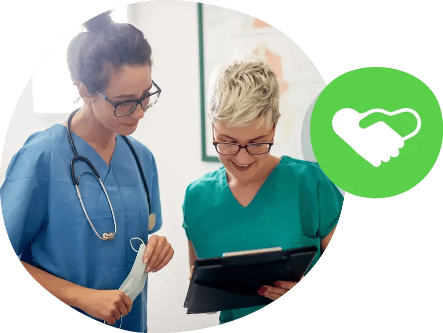 Research site staff reviewing patient information